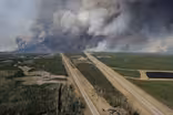 In Alberta’s heartland, wildfire forces thousands to flee