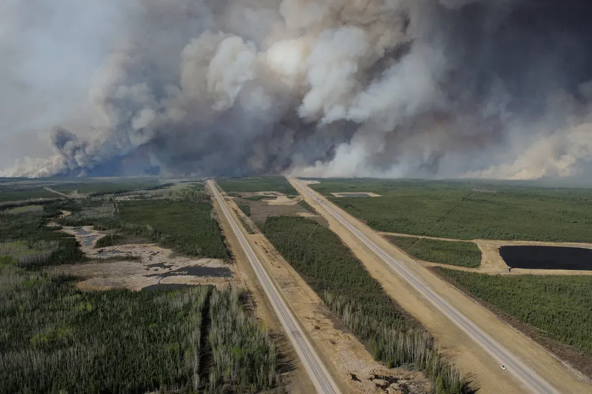 In Alberta’s heartland, wildfire forces thousands to flee