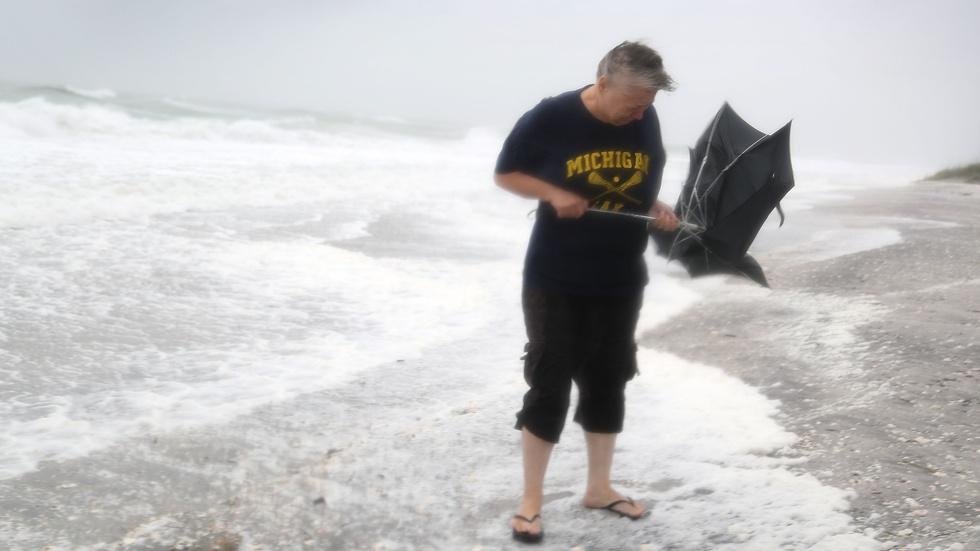 News Wrap: Tropical storm slams FL; Syrian forces make gains image
