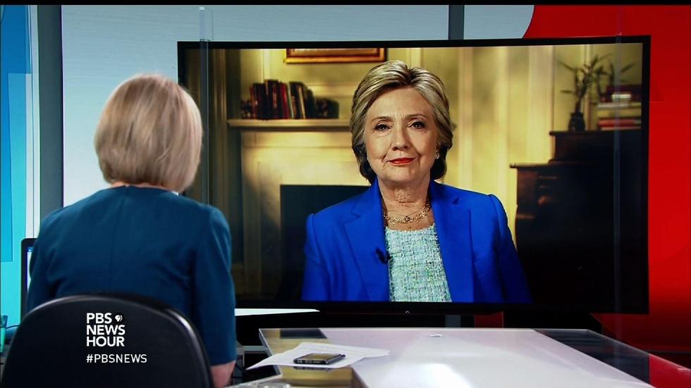 After historic victory, Clinton on “great threat” of Trump image