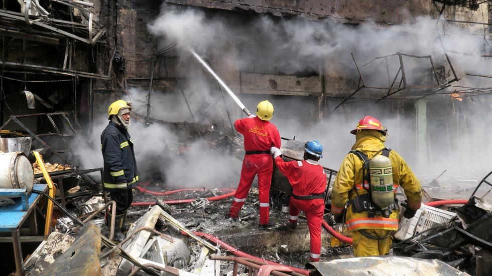 News Wrap: ISIS attacks kill dozens in Baghdad image
