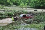 News Wrap: Flood-ravaged West Virginia braces for more rain