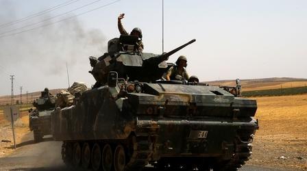 Video thumbnail: PBS NewsHour News Wrap: U.S. tells Turkey to focus on ISIS, not Kurds