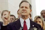 News Wrap: Alabama justice banned over gay marriage licenses