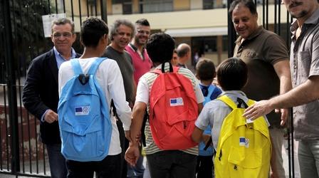 Video thumbnail: PBS NewsHour Greece sends stranded refugee children to school