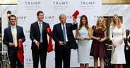 Candidates use Trump's new hotel as election metaphor