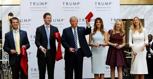 Candidates use Trump's new hotel as election metaphor