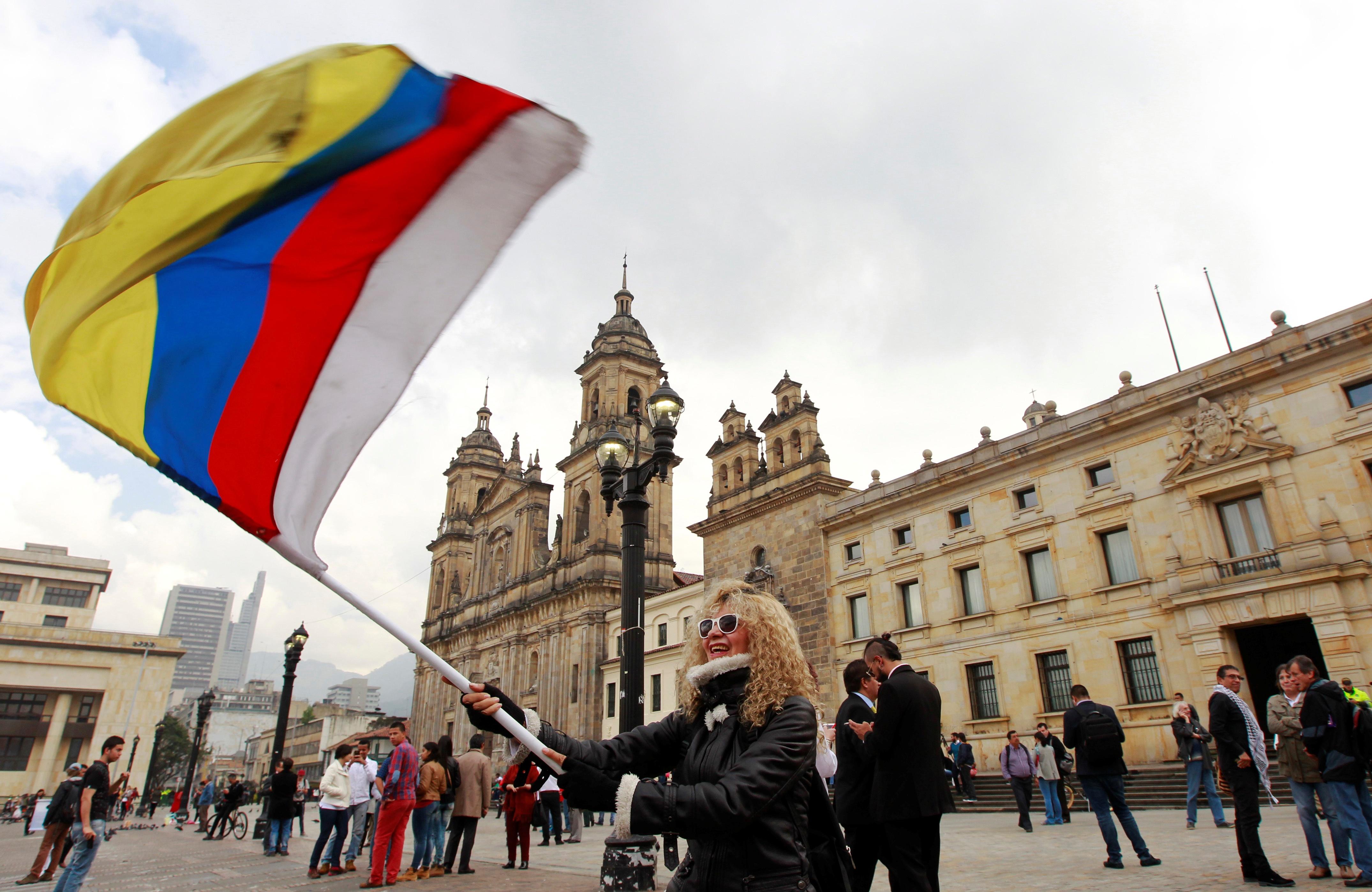 Amidst violence, Colombia signs new peace deal with FARC