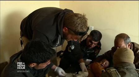 Video thumbnail: PBS NewsHour These volunteers risk their lives to save Mosul's injured