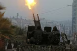 News Wrap: Syrian forces on the verge of recapturing Aleppo