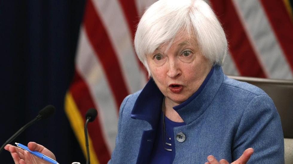 Raising interest rate, Fed sees stronger economy image
