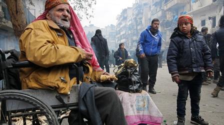 Video thumbnail: PBS NewsHour As Aleppo lies in ruins, thousands wait to escape