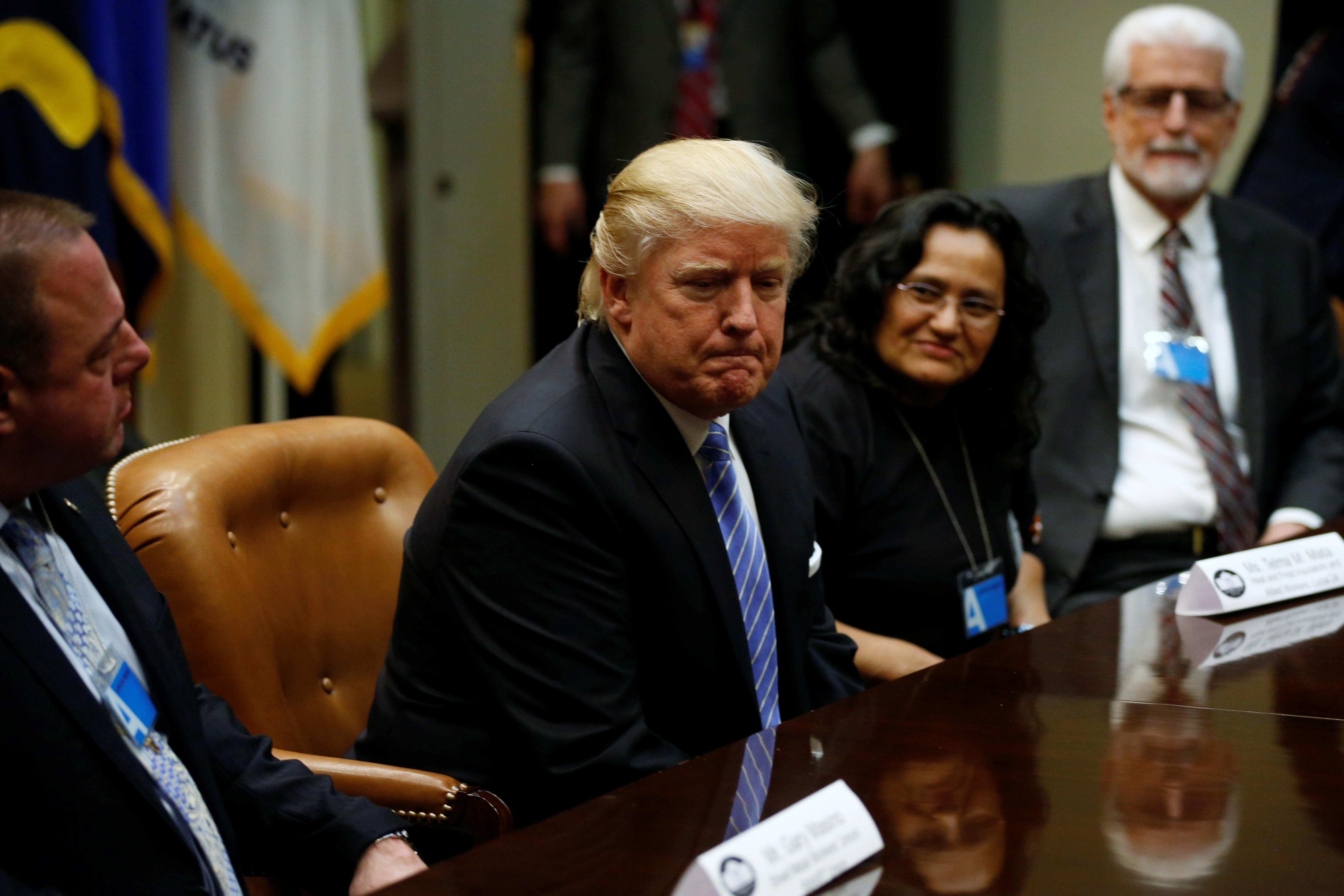 Trump refocuses on the economy after a rocky rollout