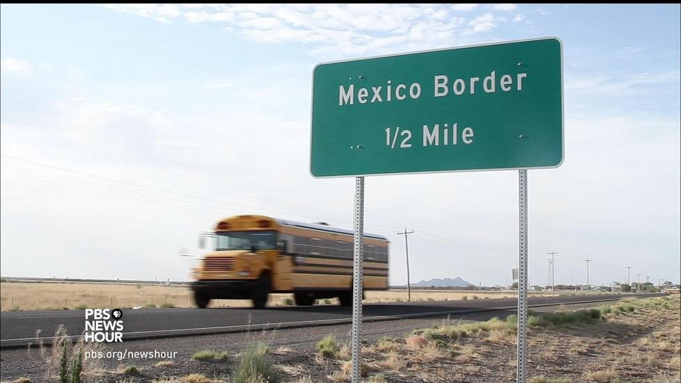 This school welcomes families who live across the border image