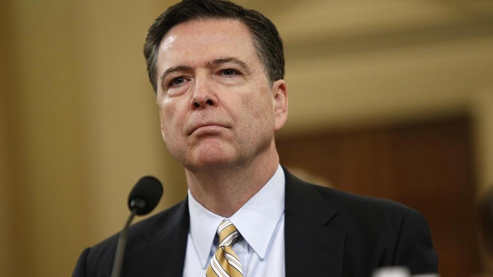 Comey confirms Russia probe, but not Trump wiretap claim image
