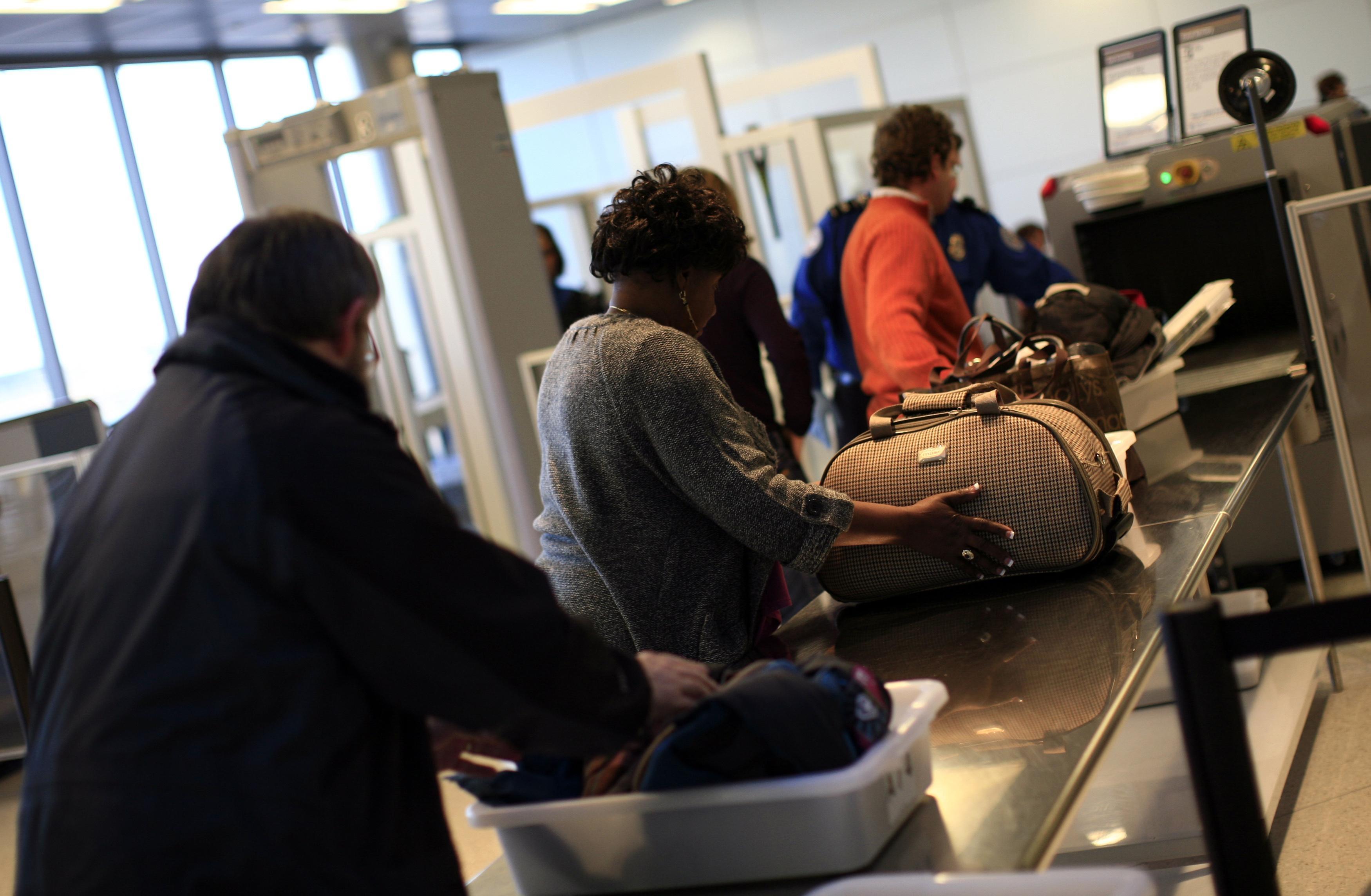 What sparked a new carry-on electronics ban on some flights?