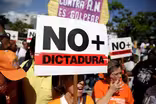 After protests, Venezuela restores power to congress