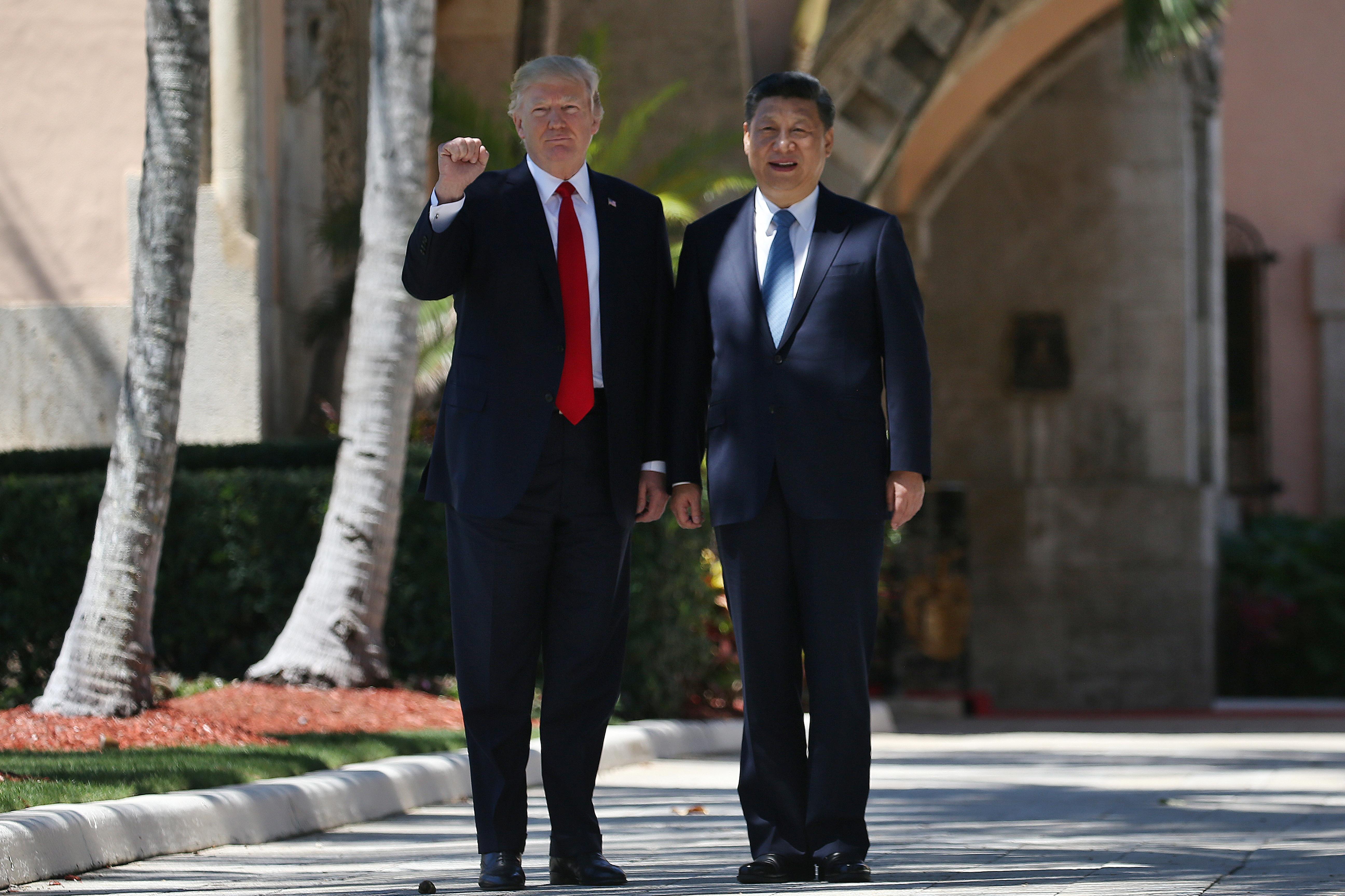 Trump and China’s Xi meet as N. Korea, trade tensions loom