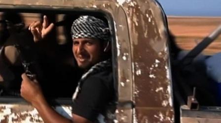 Video thumbnail: PBS NewsHour Gadhafi's Family Flees, but Hunt Remains for Libyan Leader
