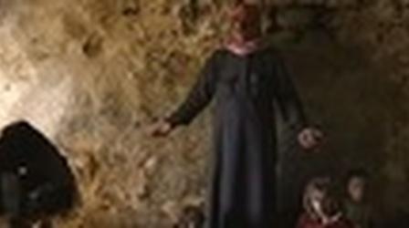 Video thumbnail: PBS NewsHour Refugees Take Shelter Underground in Abandoned Syrian Town
