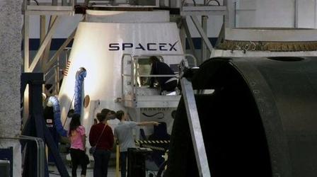 Video thumbnail: PBS NewsHour SpaceX Boldly Looks to Blast 'Millions of People to Mars'