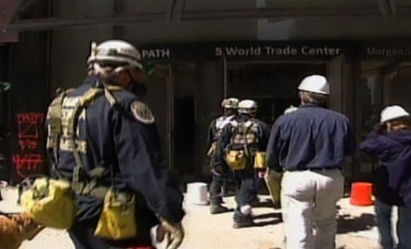Search and Rescue Teams Sift Through Rubble at Ground...