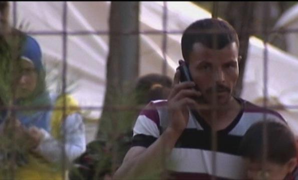 Fearing Military Assault, Thousands Flee Northern Syrian...