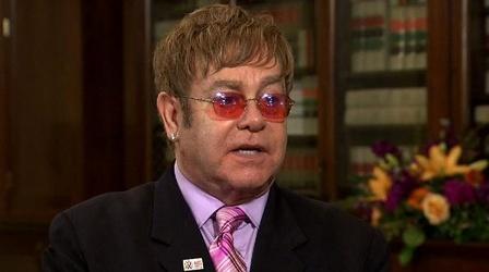 Video thumbnail: PBS NewsHour Elton John on AIDS: Compassion is Part of the Cure