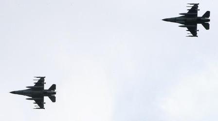 Video thumbnail: PBS NewsHour Coalition Airstrikes Target Gadhafi's Forces, Build...