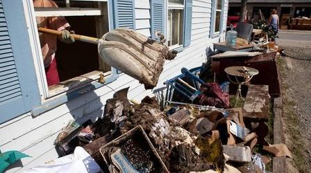 Video thumbnail: PBS NewsHour Flood Waters Still Wreak Havoc in Northeast as Costs Mount