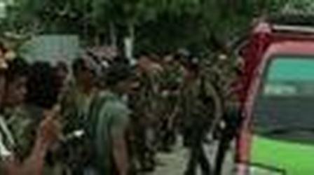 Video thumbnail: PBS NewsHour Protecting Civilians in a Conflict Zone With Eyes, Notepad