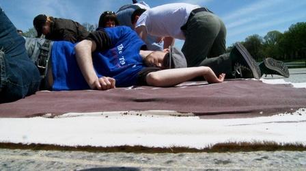 Video thumbnail: PBS NewsHour Flash Mob Uses Chalk as Weapon Against Gun Violence