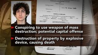 Bombing Suspect Arraigned on Charges While Hospitalized