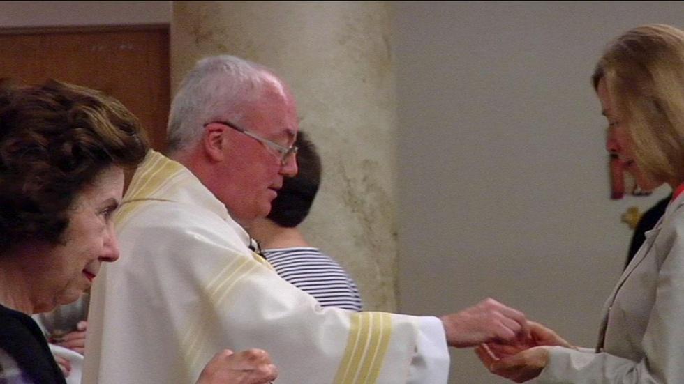 The Priest and the People image
