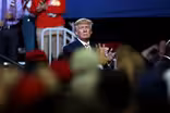 Trump takes victory lap and strikes deal to save job