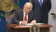 Two federal courts block new travel ban