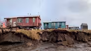 As water levels rise, an Alaska town flees to higher ground