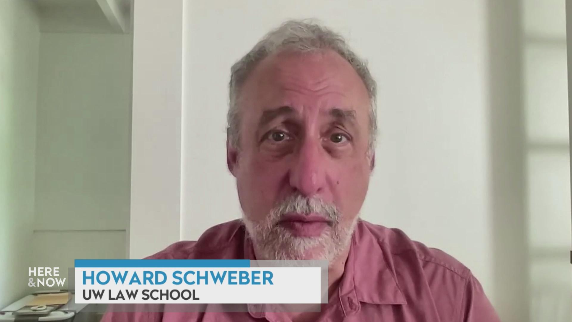 A still image from a video shows Howard Schweber seated in front of a white wall with a graphic at bottom reading 'Howard Schweber' and 'UW Law School.'