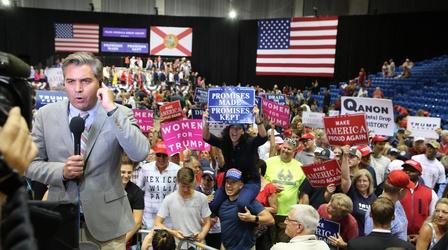 Video thumbnail: PBS NewsHour How a false, fringe conspiracy theory aims to protect Trump
