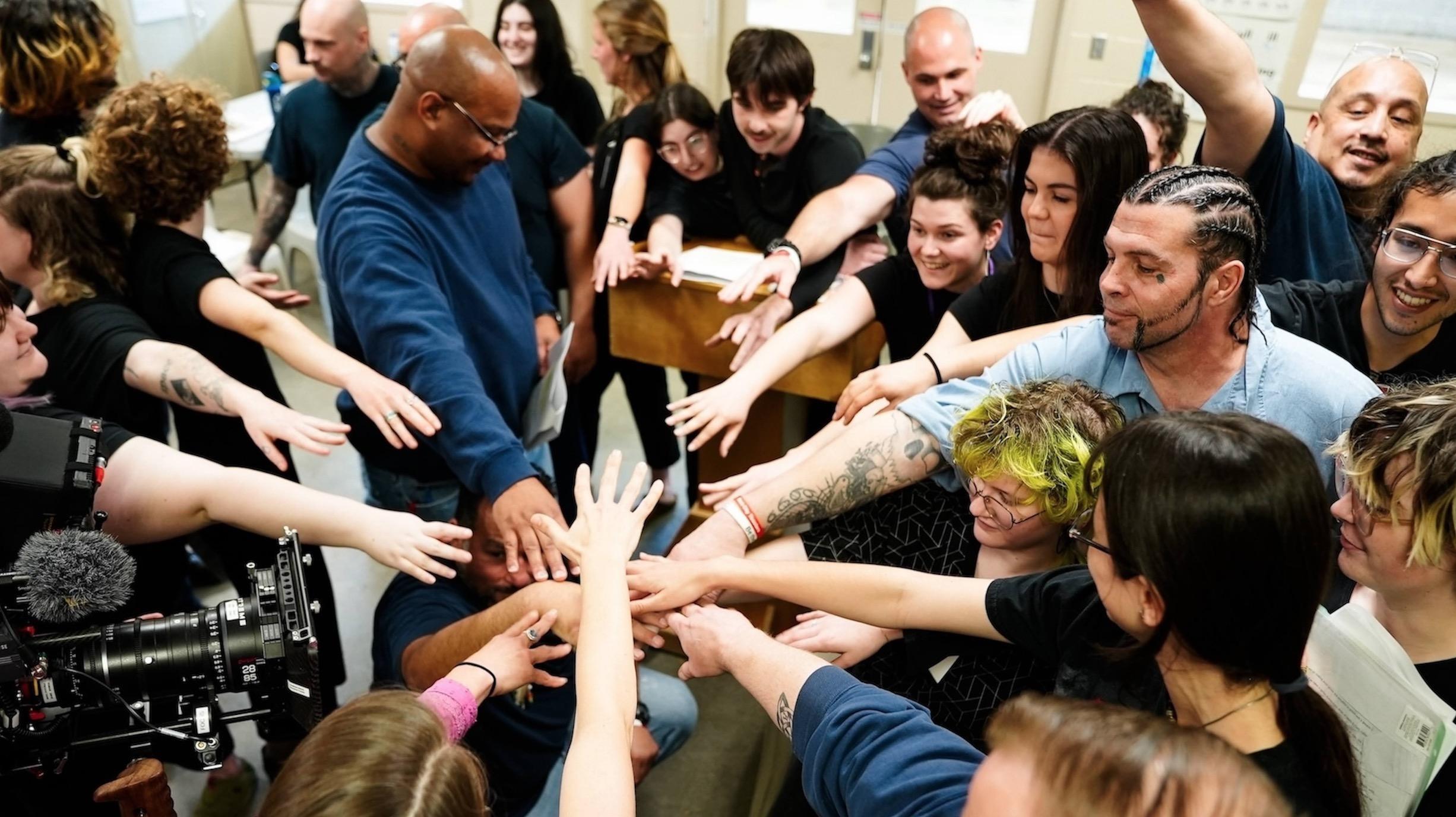 A history professor teaches a class of free and incarcerated students inside a prison.