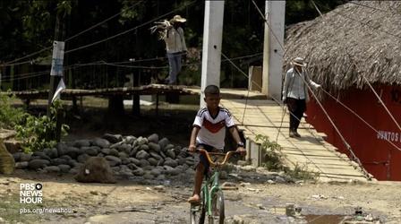 Video thumbnail: PBS NewsHour FARC drops its weapons, but deadly conflict goes on