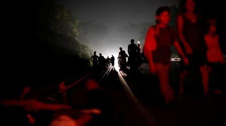 Video thumbnail: PBS NewsHour Stories from the migrant caravan yearn for safety, family