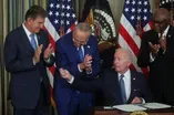 Biden racks up legislative wins despite low approval ratings