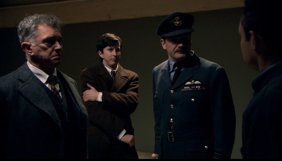 Gently and Bacchus try to determine the identity of a body found in a wooded area.