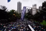 After recent chaos, Hong Kong protesters hold peaceful march
