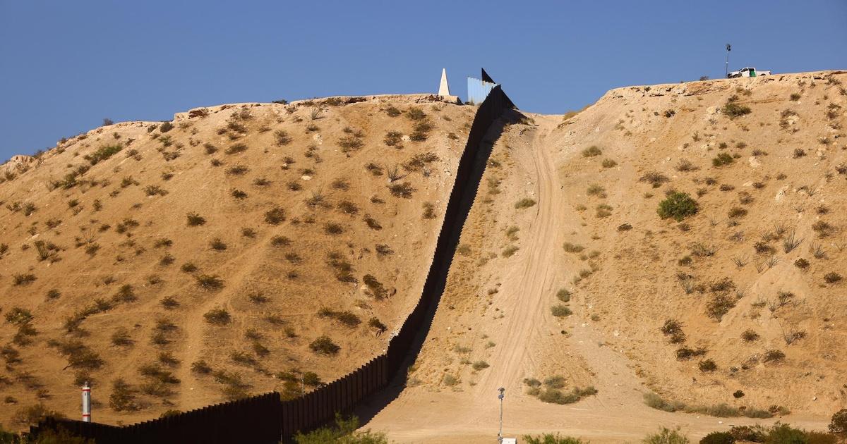 PBS News Hour | News Wrap: Biden administration allows new border wall ...