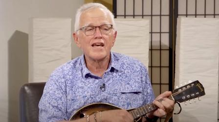 Video thumbnail: NC Bookwatch Clyde Edgerton sings "Walking Across Egypt"