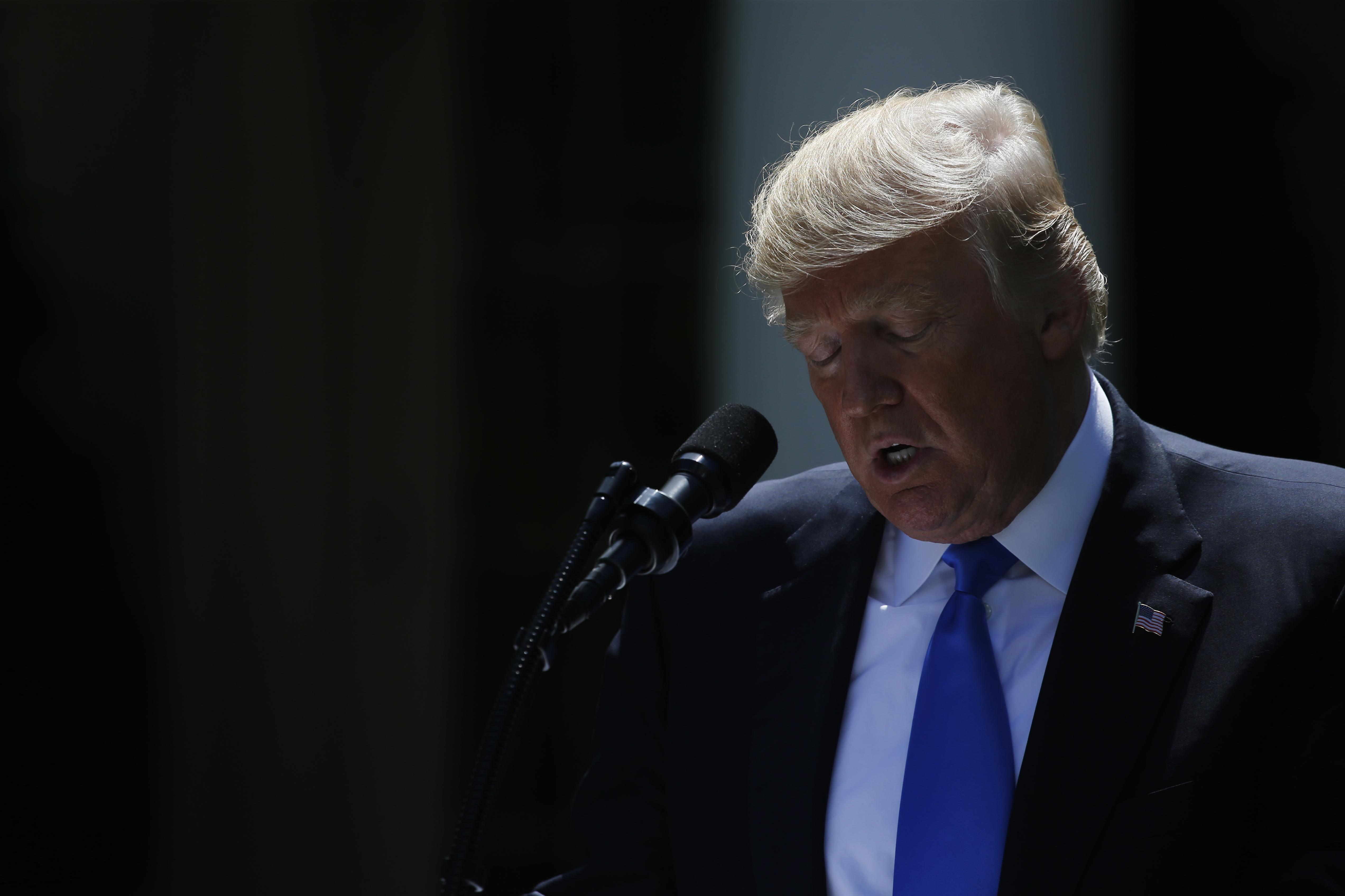 News Wrap: Trump calls out Qatar over extremism funding