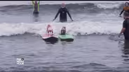 A surfing contest where everyone doggie paddles