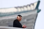 News Wrap: Trump praises Kim Jong Un for not firing at Guam